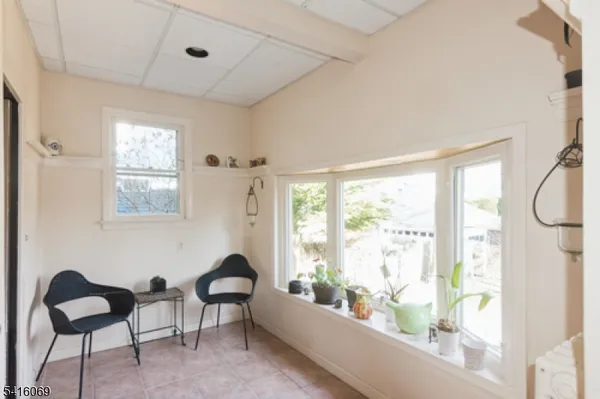 a kitchen with stainless steel appliances granite countertop a refrigerator a stove and a sink