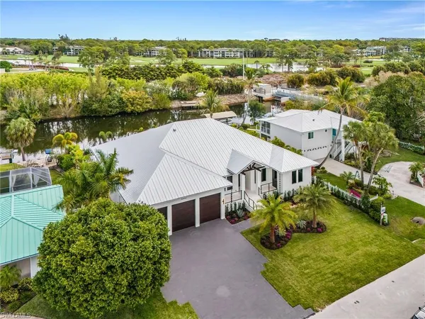 an aerial view of a house with a garden