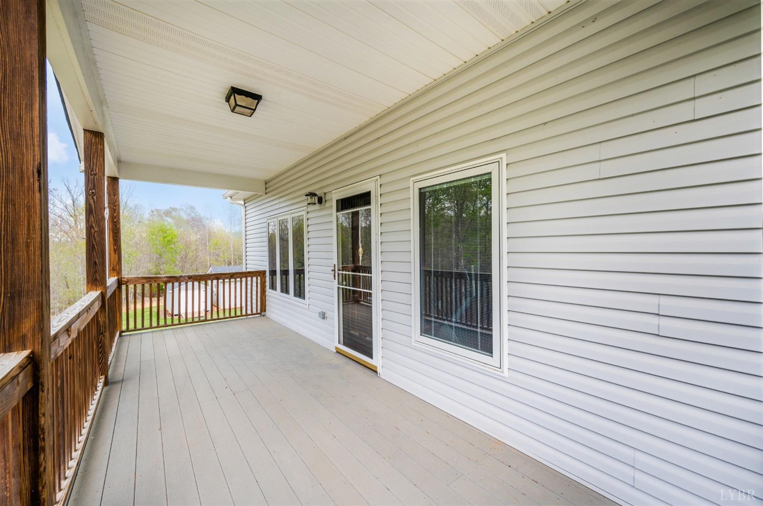 239 Little Farm Road Amherst, VA 24521 - Photo 4 of 59 a view of a porch with wooden floor
