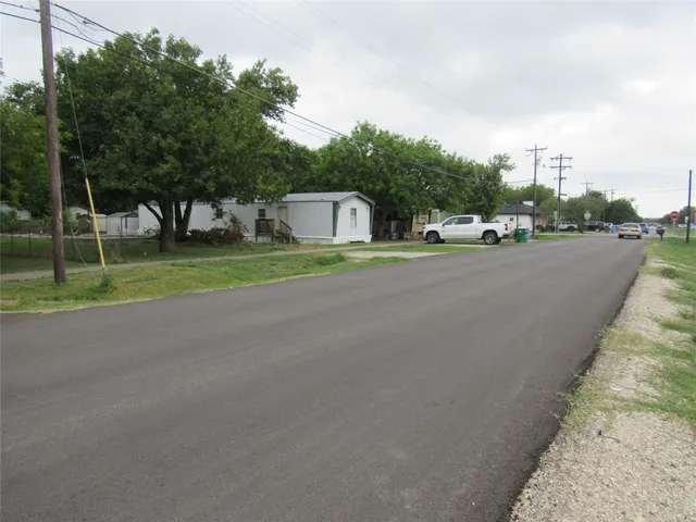 a view of backyard with green space