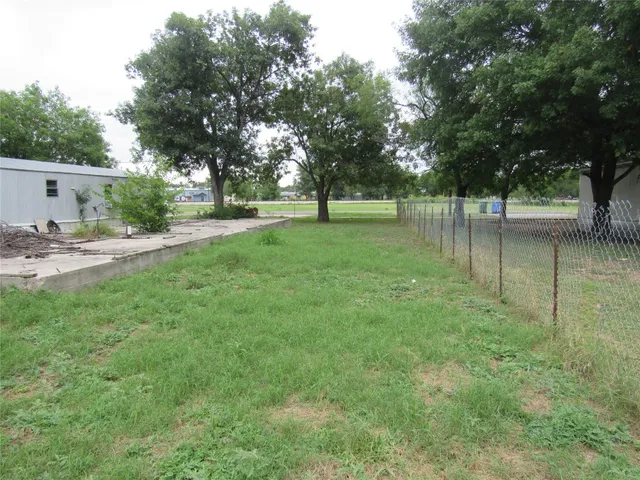 a view of backyard with green space