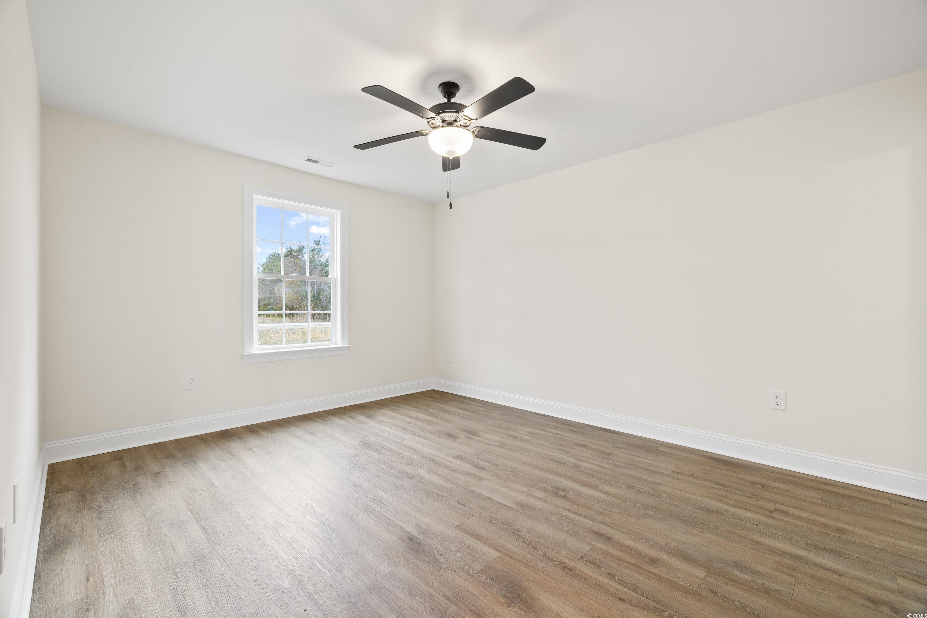 3640 Bethel Chapel Road Loris, SC 29569 - Photo 29 of 35 Empty room featuring light wood-type flooring and ceiling fan