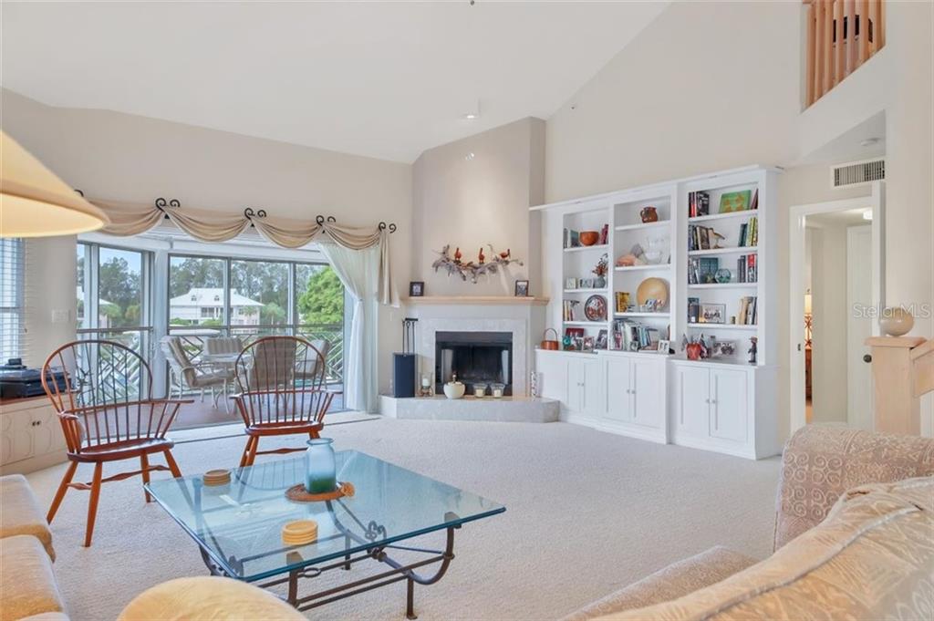 11000 Placida Road, Unit 1003 Placida, FL 33946 - Photo 9 of 41 Spacious Living room overlooks marina