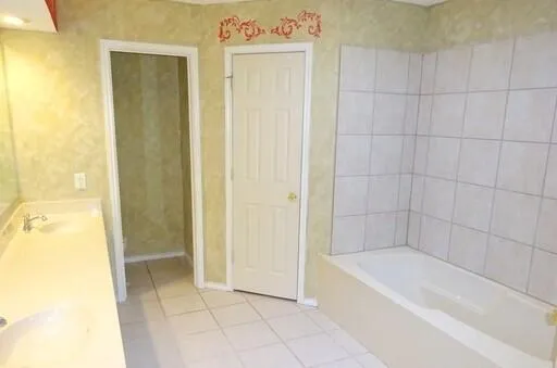 a bathroom with a bathtub