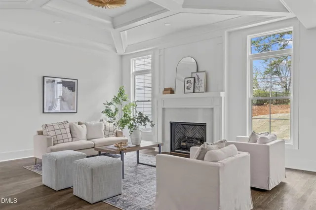 a living room with couches and a fireplace