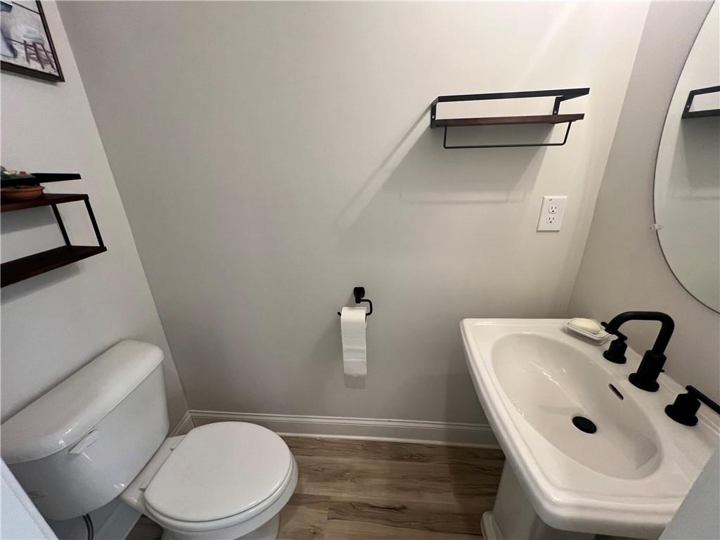 1337 Parc Bench Road Atlanta, GA 30316 - Photo 5 of 35 a bathroom with a sink toilet and mirror