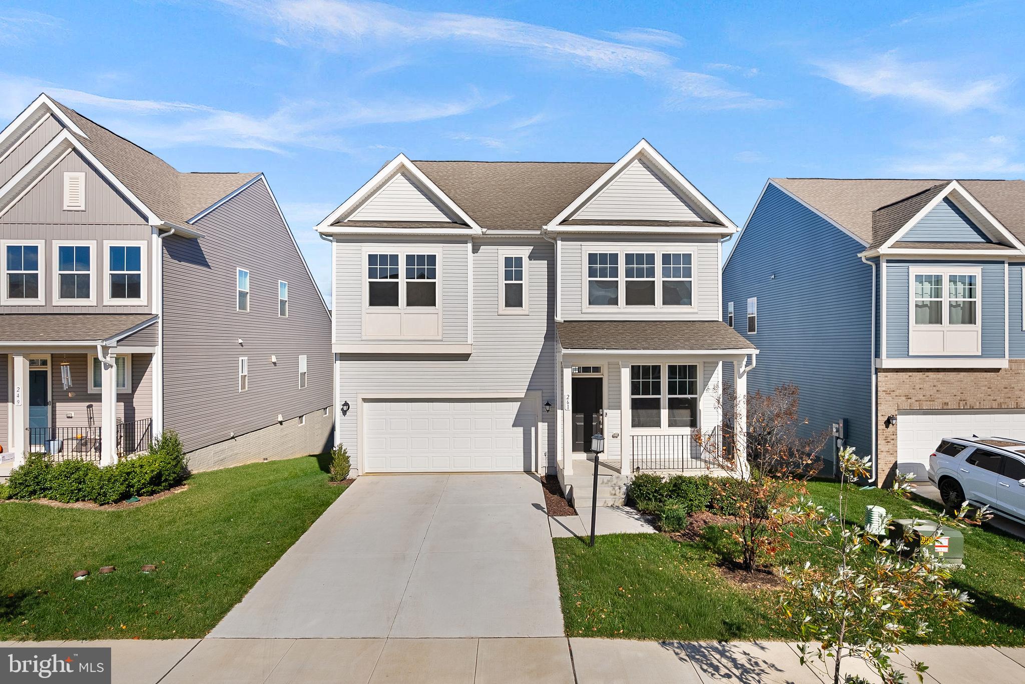 a view of house with yard