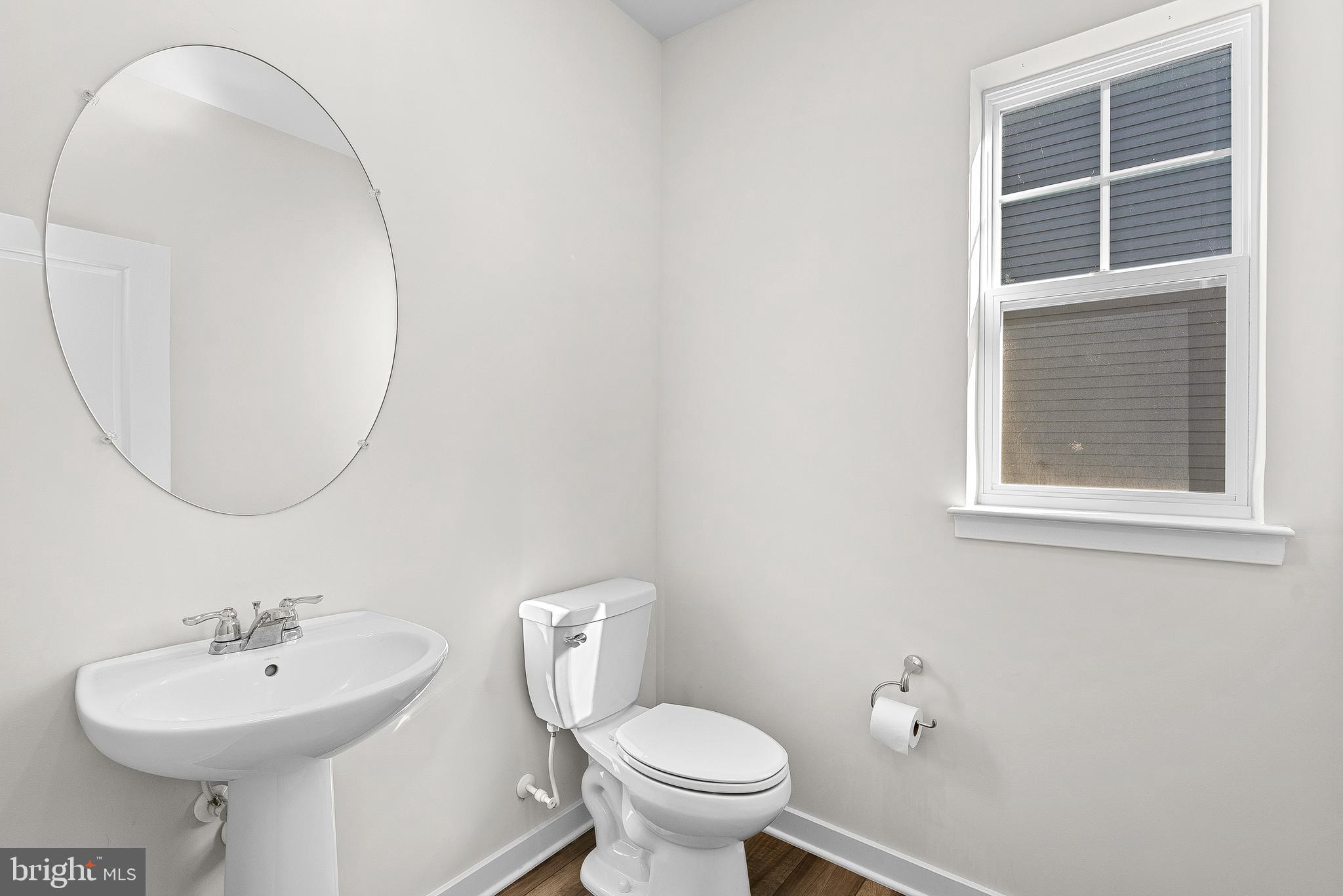 261 Short Br Drive Ranson, WV 25438 - Photo 11 of 71 a bathroom with a sink a toilet and a mirror