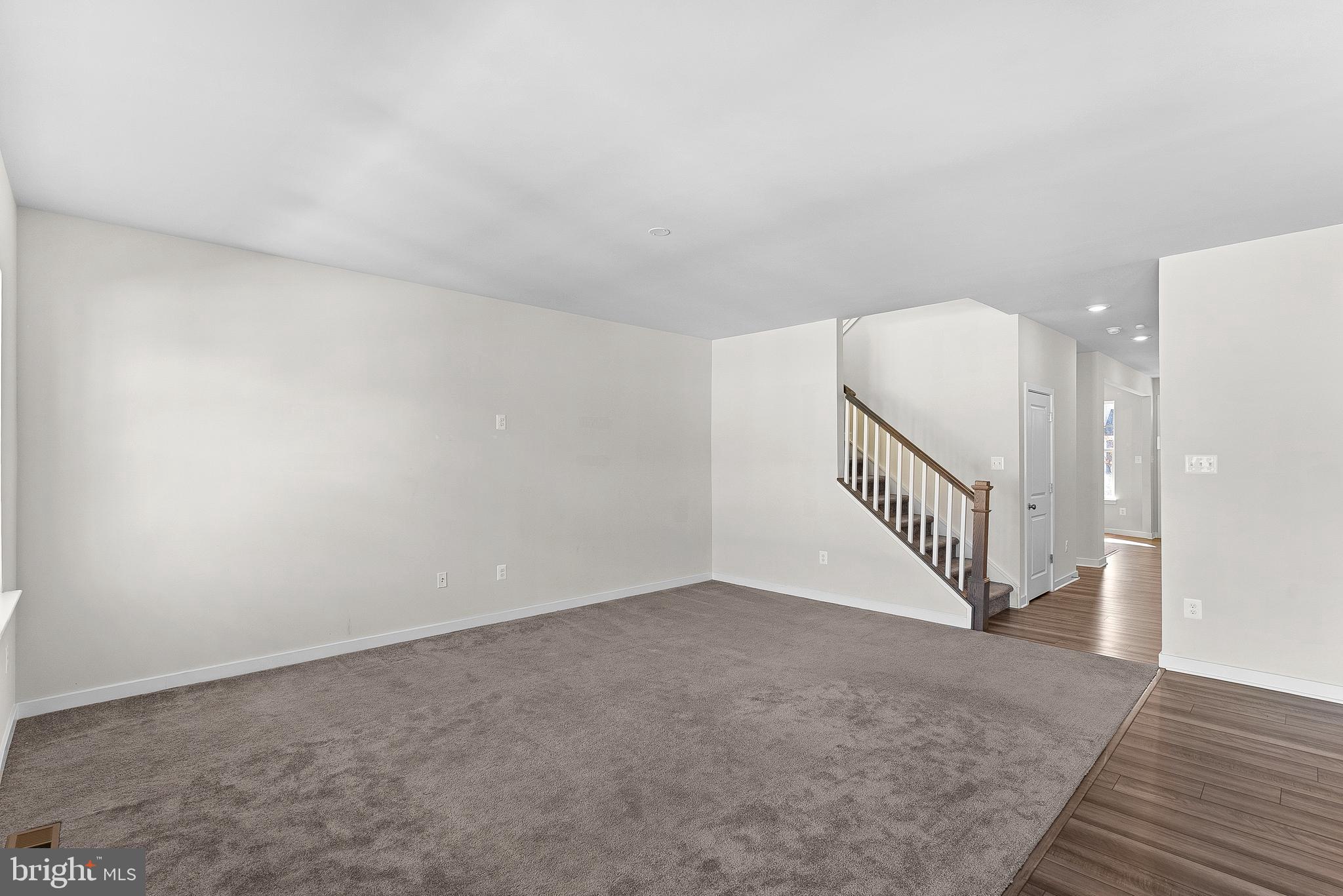 261 Short Br Drive Ranson, WV 25438 - Photo 16 of 71 a view of an entryway with wooden floor