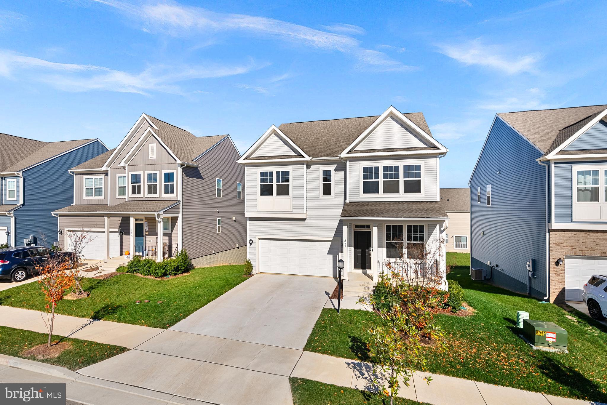 261 Short Br Drive Ranson, WV 25438 - Photo 2 of 71 a front view of a house with a yard