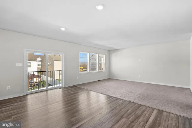 a bathroom with a double vanity sink and mirror