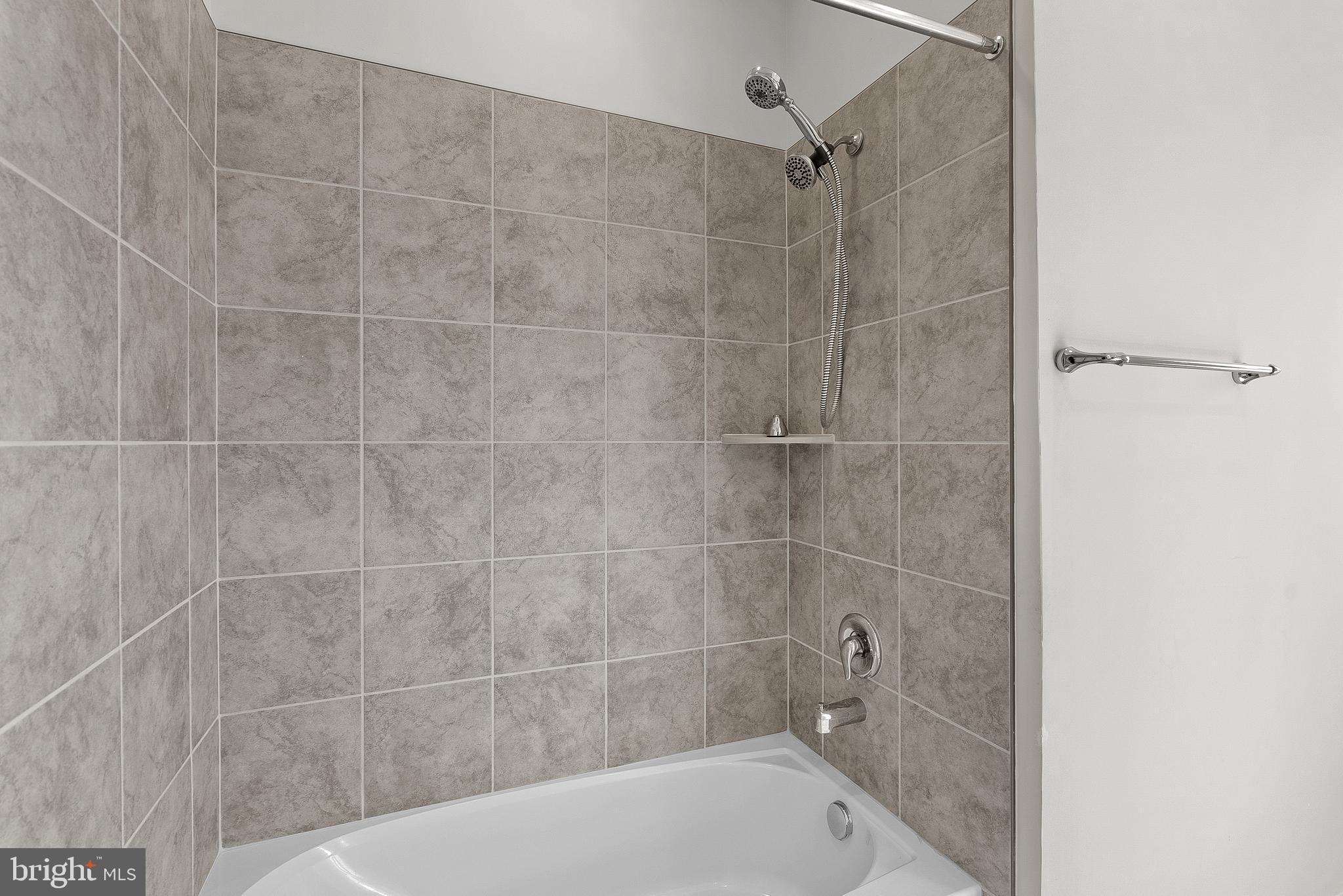 261 Short Br Drive Ranson, WV 25438 - Photo 52 of 71 a bathroom with a bathtub and shower