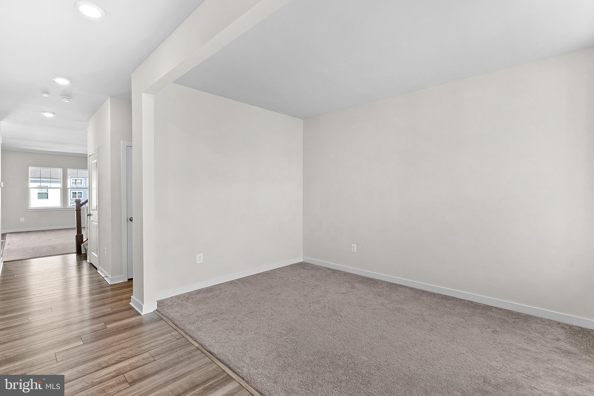 261 Short Br Drive Ranson, WV 25438 - Photo 7 of 71 wooden floor in an empty room with a window