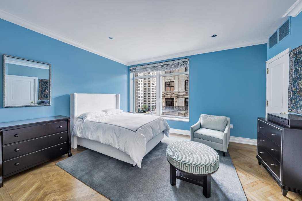 515 Park Avenue, Unit 5A Manhattan, NY 10022 - Photo 12 of 19 a bedroom with a bed and a couch