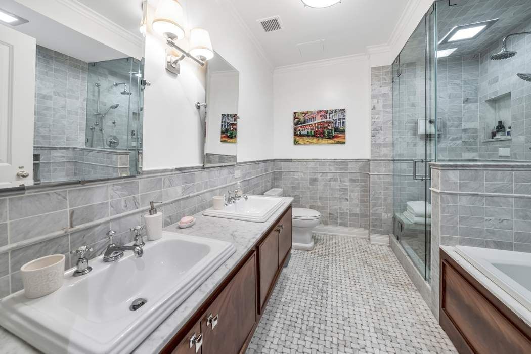 515 Park Avenue, Unit 5A Manhattan, NY 10022 - Photo 16 of 19 a bathroom with a sink and a mirror