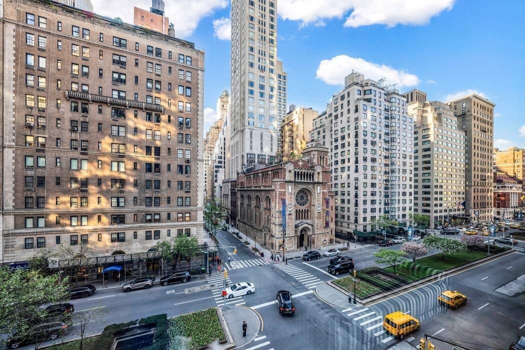 515 Park Avenue, Unit 5A Manhattan, NY 10022 - Photo 18 of 19 a view of a city with tall buildings