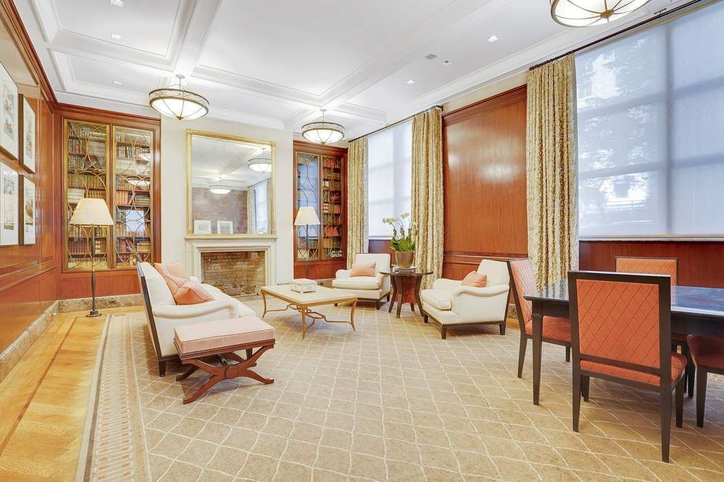 515 Park Avenue, Unit 5A Manhattan, NY 10022 - Photo 6 of 19 a living room with patio furniture and a large window