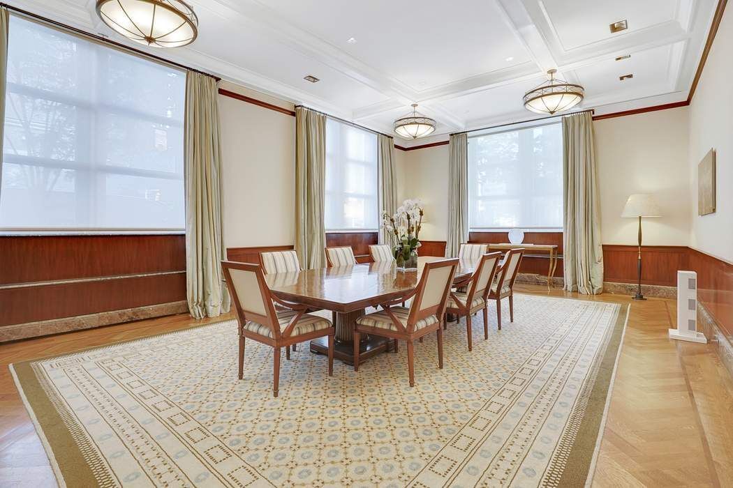515 Park Avenue, Unit 5A Manhattan, NY 10022 - Photo 7 of 19 a view of a dining room with furniture