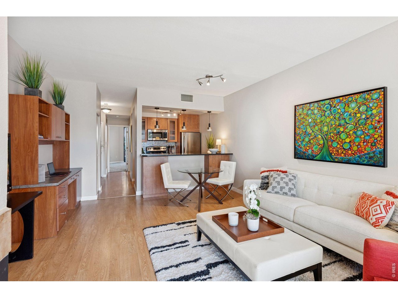 3260 47th Street, Unit 108A Boulder, CO 80301 - Photo 6 of 25 The open concept kitchen, dining and living room space flows directly to your private patio.