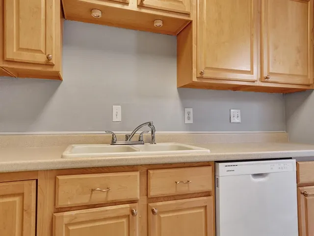a bathroom with a sink and a cabinets