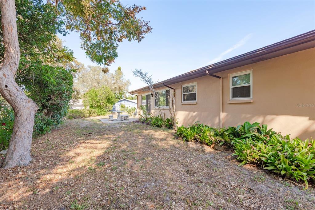 1104 Carlton Road Tarpon Springs, FL 34689 - Photo 34 of 35 a front view of a house with garden