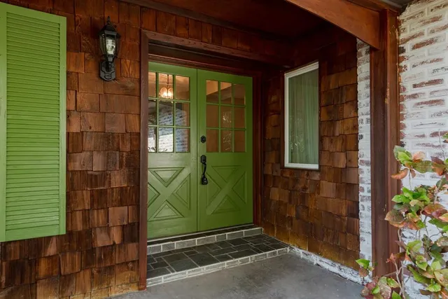 a view of a glass door of the house