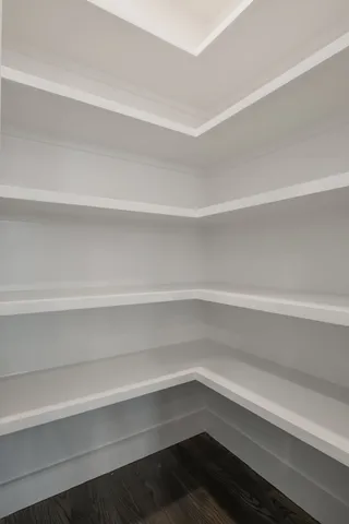 a view of an empty walk in closet