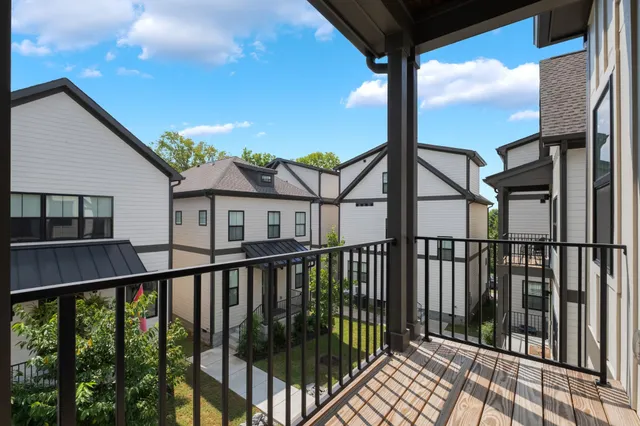 a view of a street from a balcony