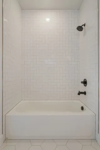 a bathroom with a bathtub