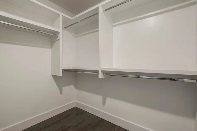 a view of an empty walk in closet
