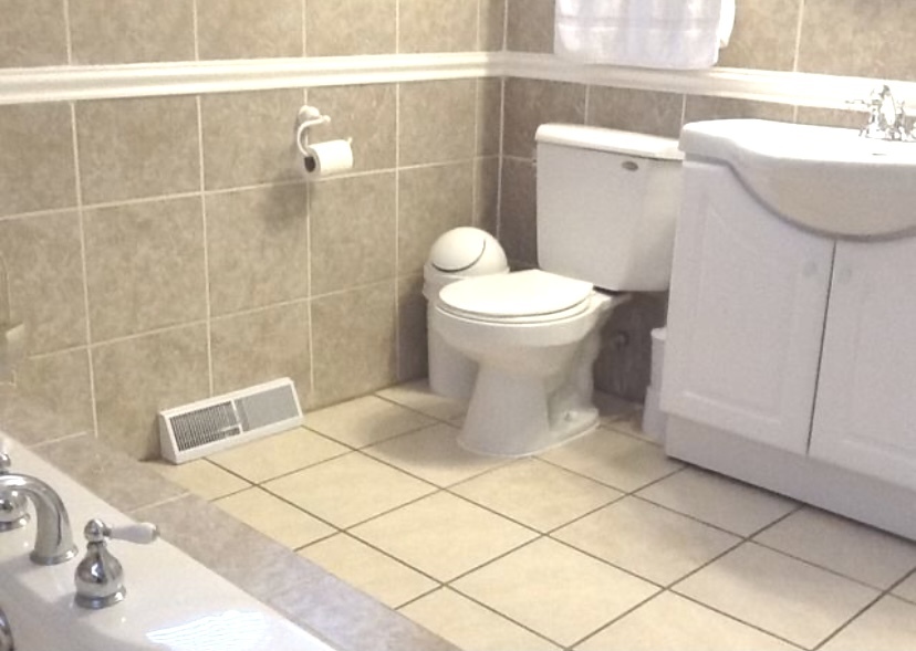 5230 State Road Burbank, IL 60459 - Photo 13 of 26 a bathroom with a sink and toilet
