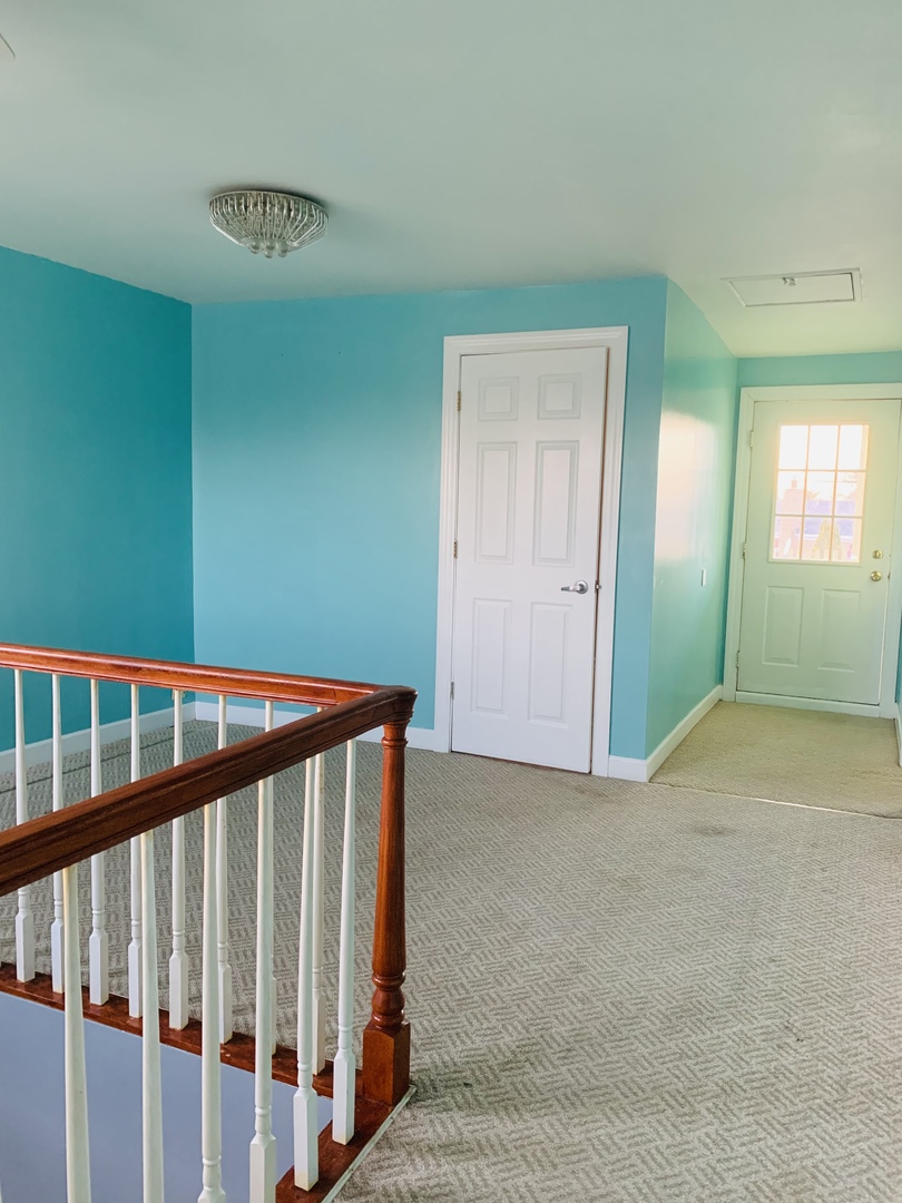 5230 State Road Burbank, IL 60459 - Photo 15 of 26 a view of a hallway with wooden floor