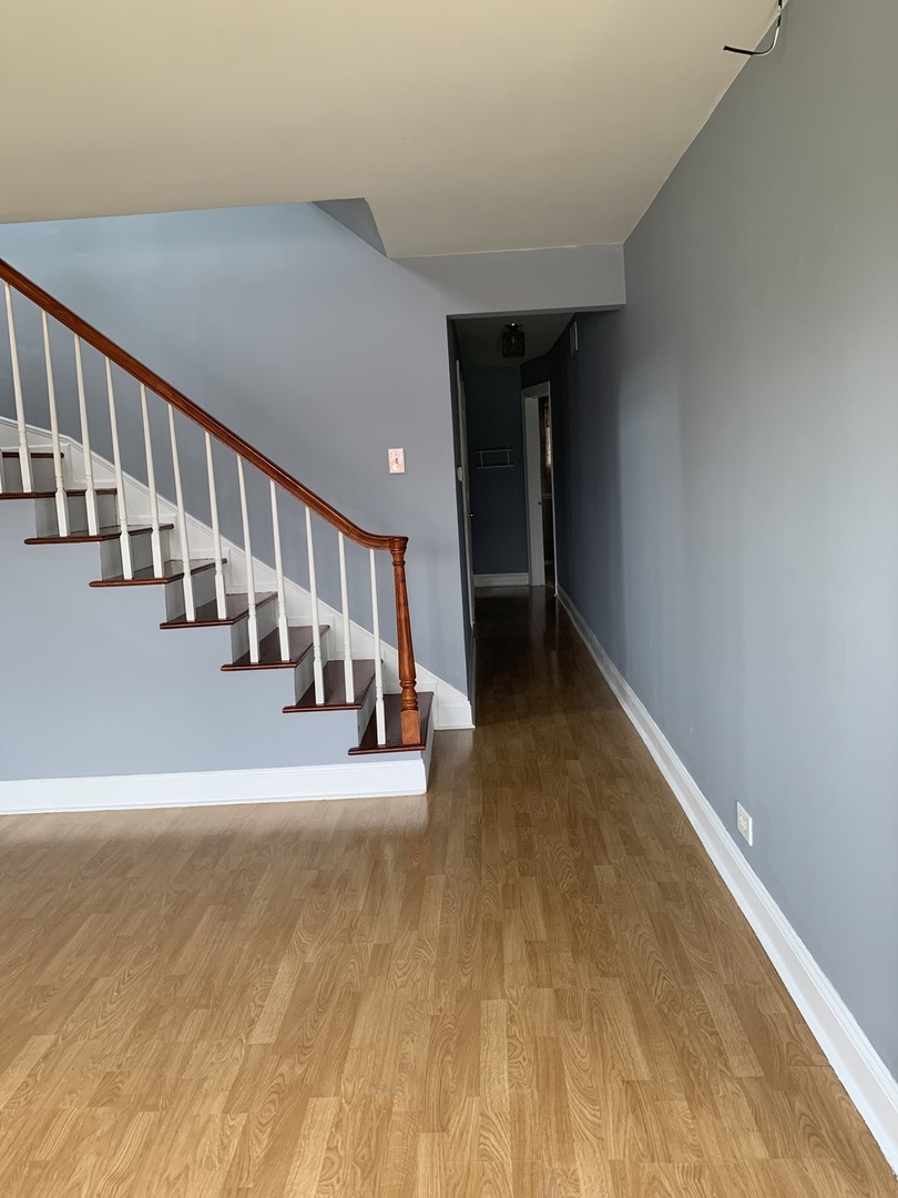5230 State Road Burbank, IL 60459 - Photo 24 of 26 a view of an entryway with wooden floor