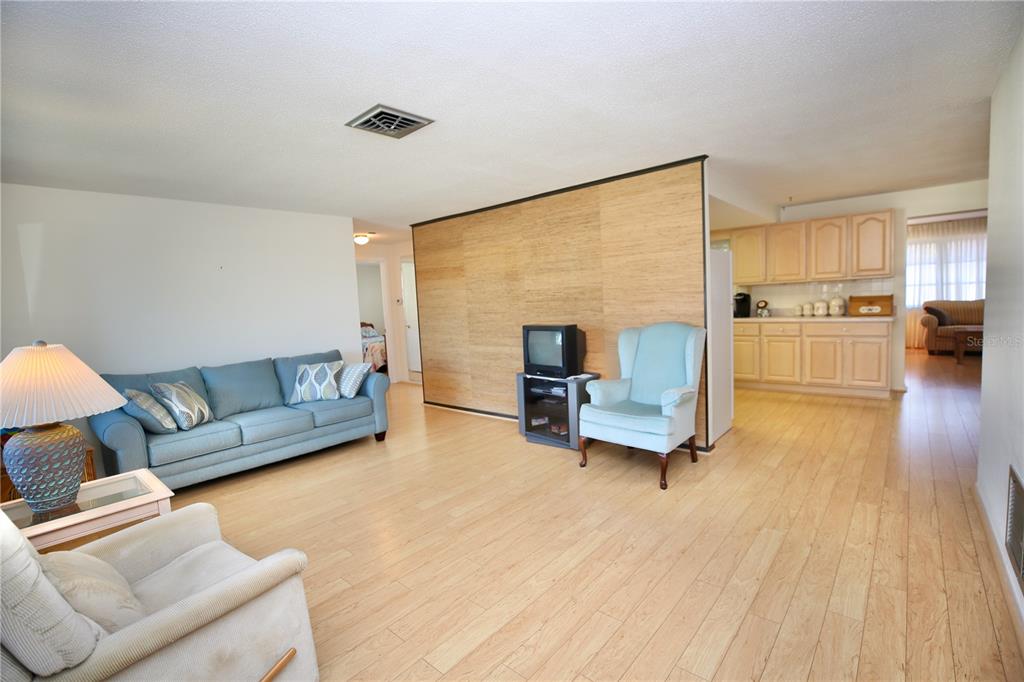 120 20th Street Southwest Largo, FL 33770 - Photo 30 of 46 a living room with furniture and a wooden floor