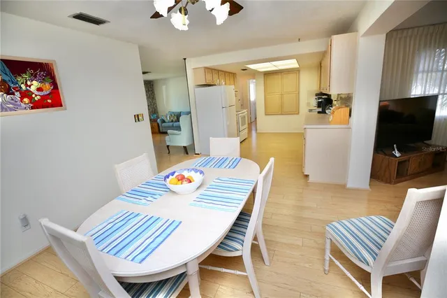 a view of a dining room with furniture