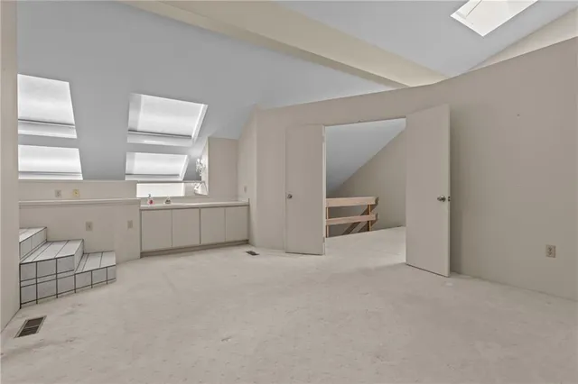 a bathroom with a bathtub and shower