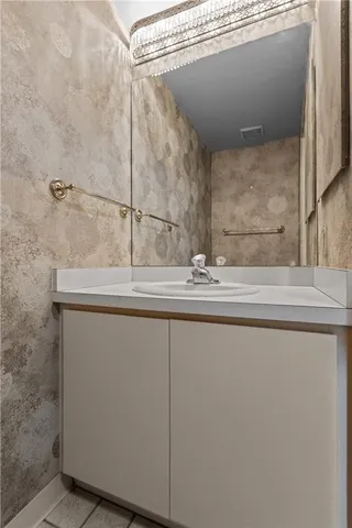 an empty room with wooden floor