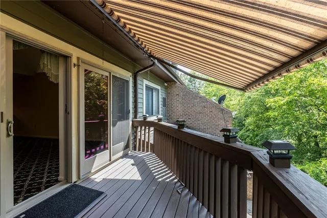 a front view of a house with a balcony