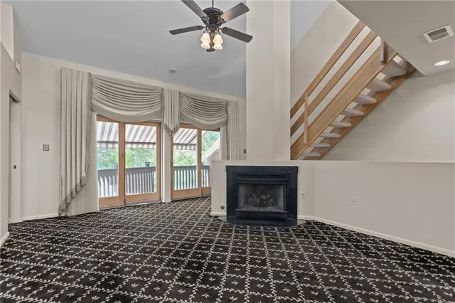 a living room with a fireplace