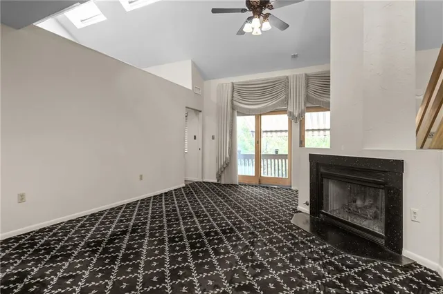 a view of a livingroom with a fireplace