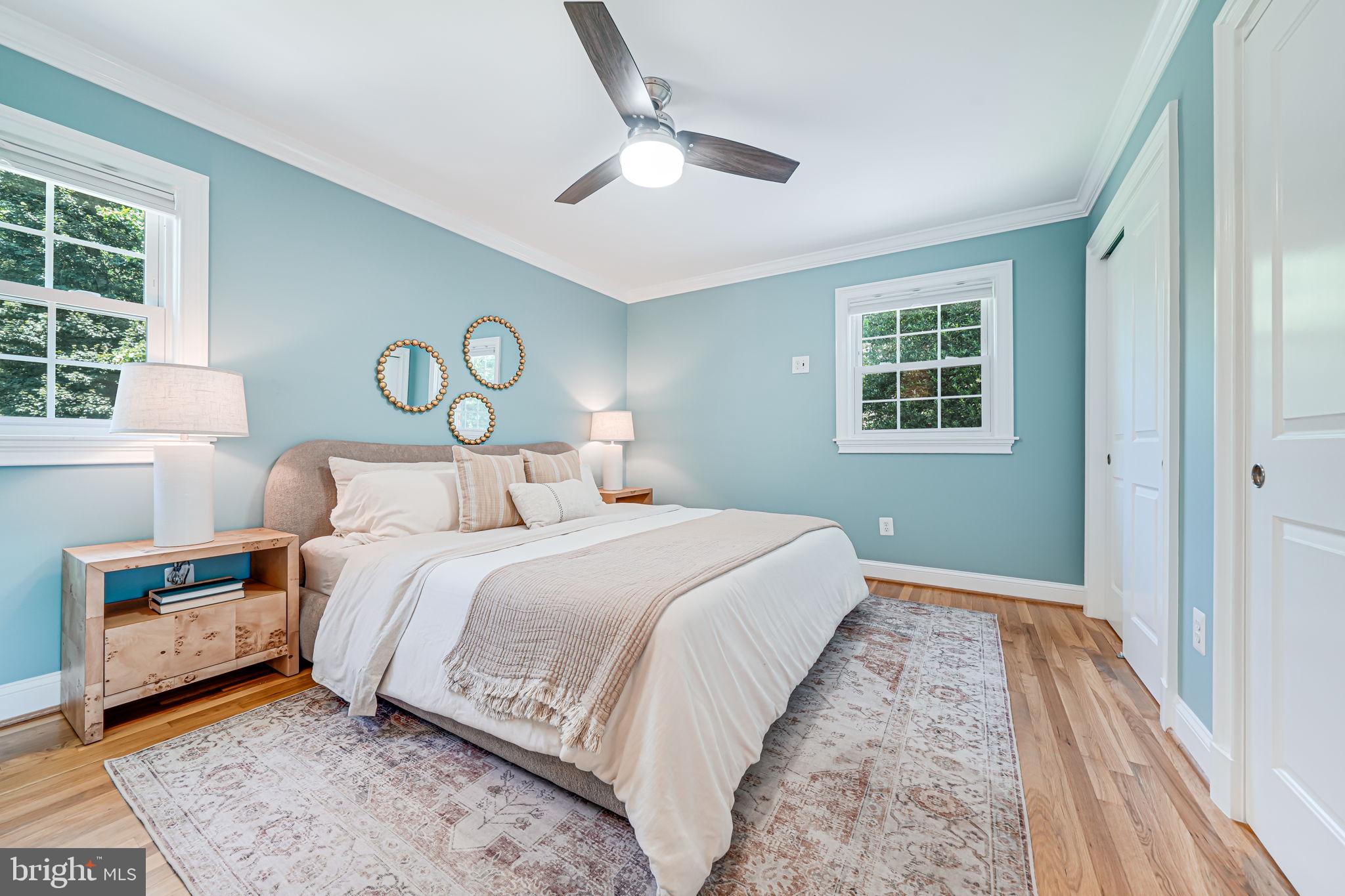 1930 Foxhall Road McLean, VA 22101 - Photo 21 of 62 a bedroom with a large bed and a window