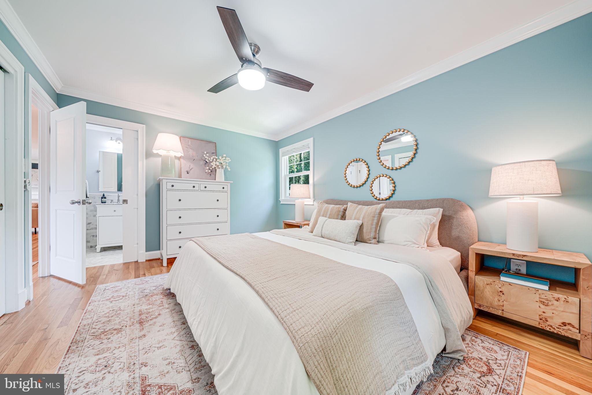 1930 Foxhall Road McLean, VA 22101 - Photo 23 of 62 a bedroom with a bed and a chandelier