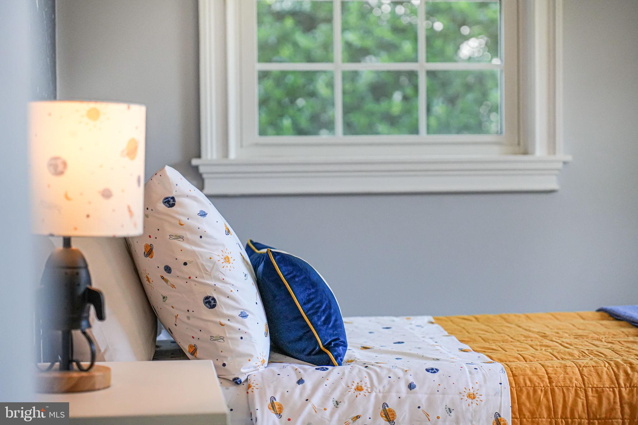 1930 Foxhall Road McLean, VA 22101 - Photo 28 of 62 a bedroom with a bed and a large window