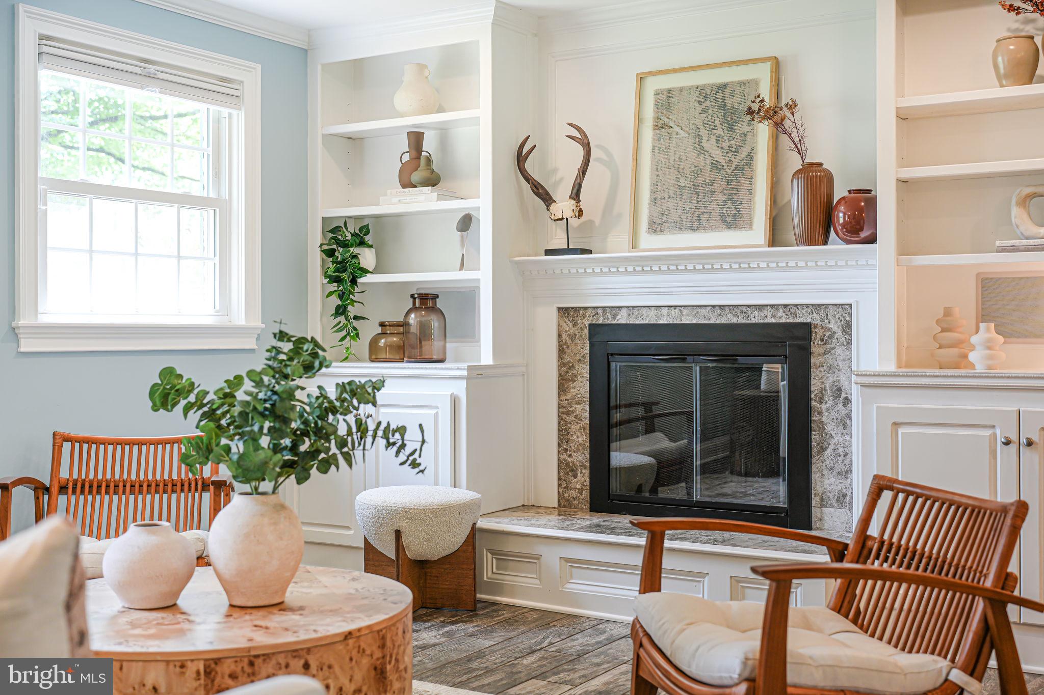 1930 Foxhall Road McLean, VA 22101 - Photo 33 of 62 a living room with furniture and a potted plant