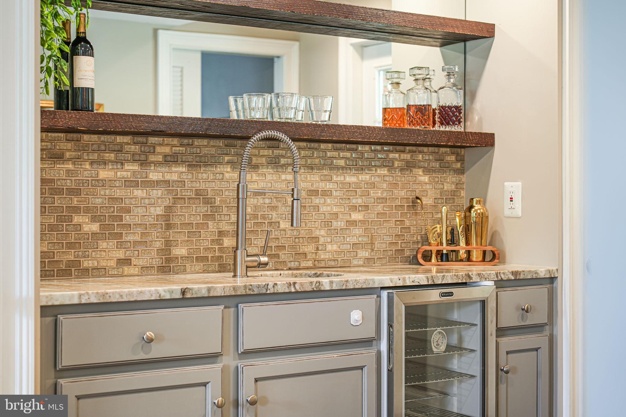 1930 Foxhall Road McLean, VA 22101 - Photo 35 of 62 a bathroom with a sink and a mirror