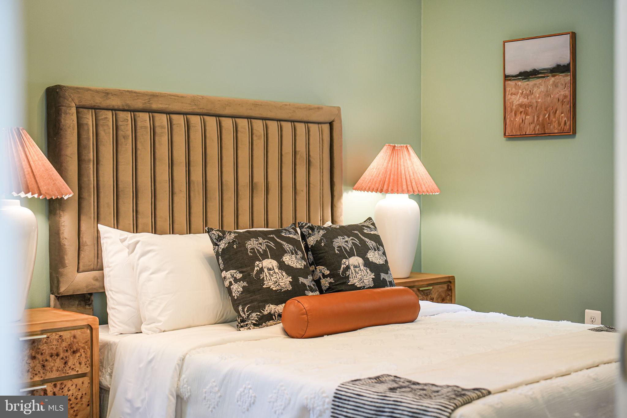 1930 Foxhall Road McLean, VA 22101 - Photo 43 of 62 a bedroom with a bed and a lamp