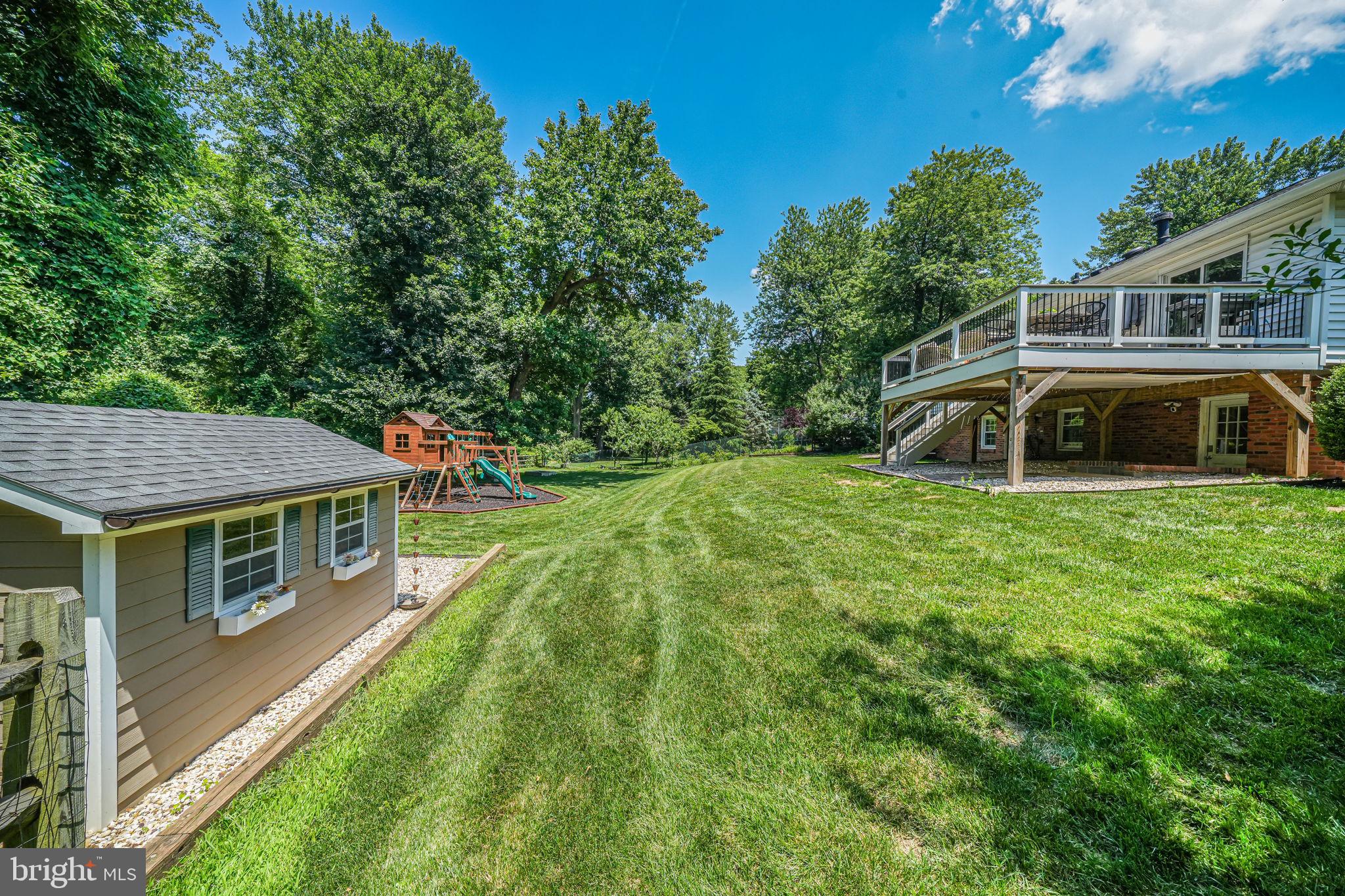 1930 Foxhall Road McLean, VA 22101 - Photo 54 of 62 a front view of a house with a yard