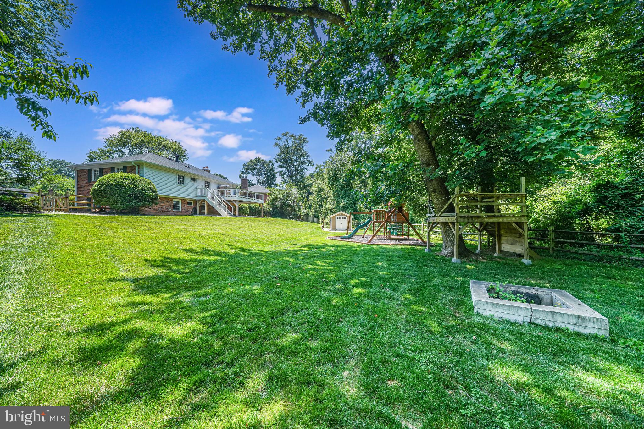 1930 Foxhall Road McLean, VA 22101 - Photo 55 of 62 a view of a garden with a house