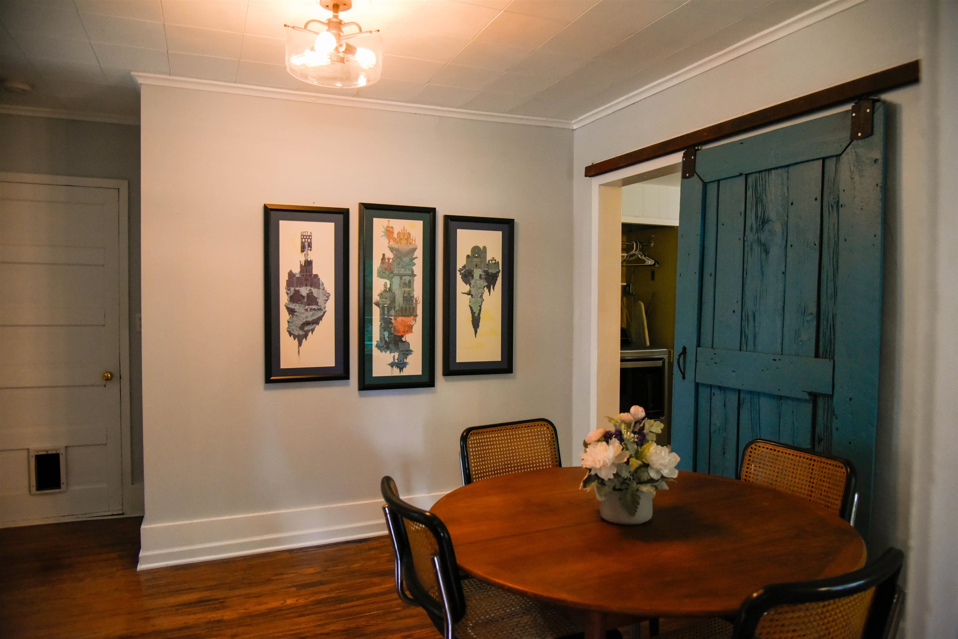 120 North Booth Street Dubuque, IA 52001 - Photo 11 of 26 a view of a dining room with furniture and wooden floor