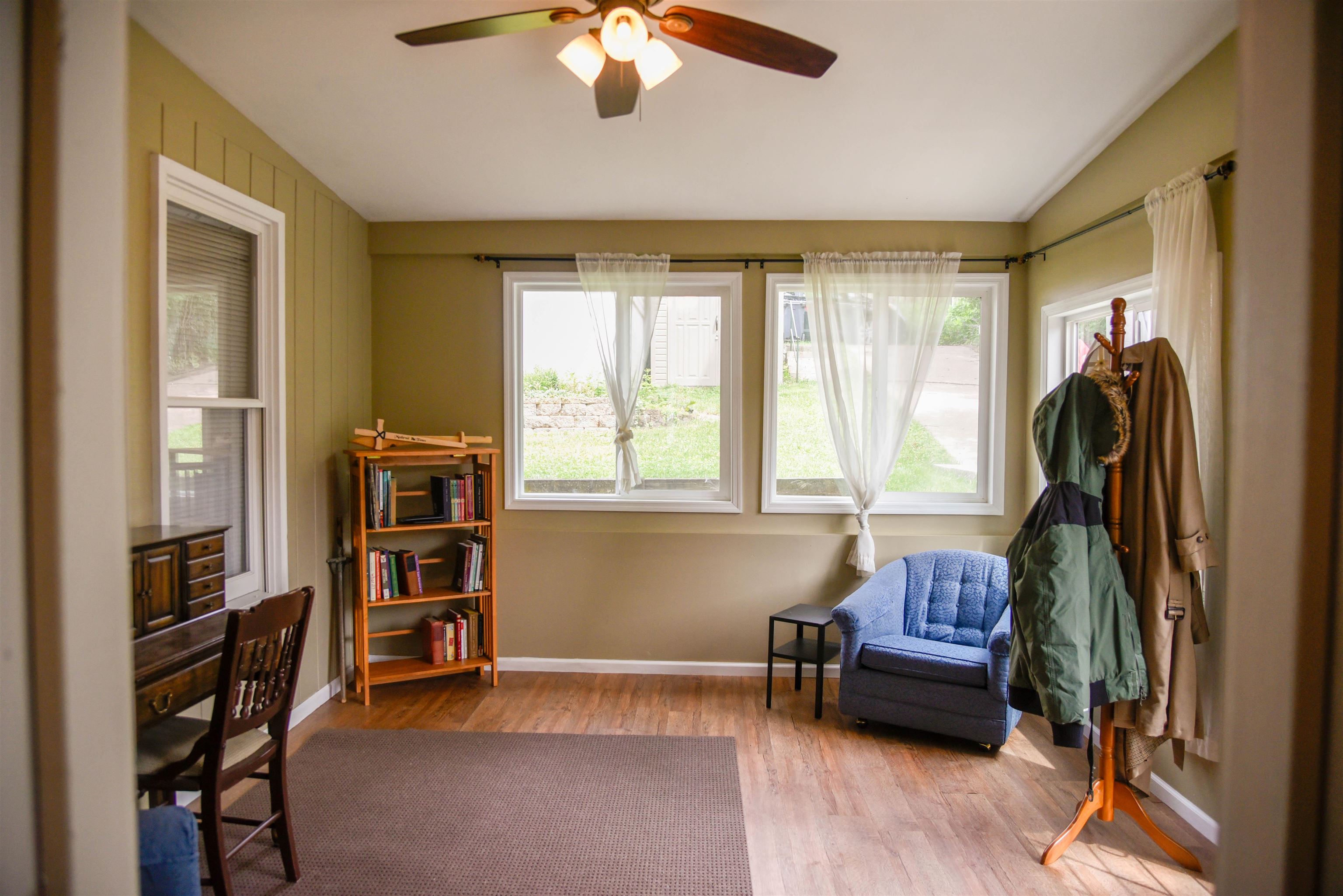 120 North Booth Street Dubuque, IA 52001 - Photo 12 of 26 a living room with furniture and a window